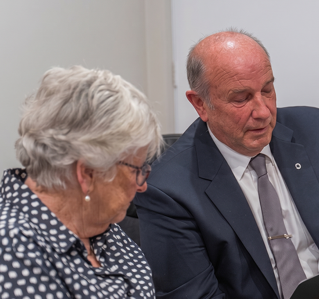 funeral arranger with local woman