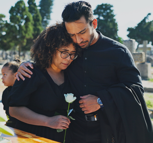 two people comforting each other