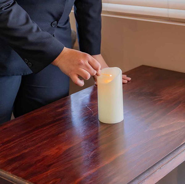 lighting a candle