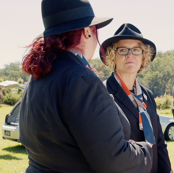 funeral director speaking with an elderly gentleman